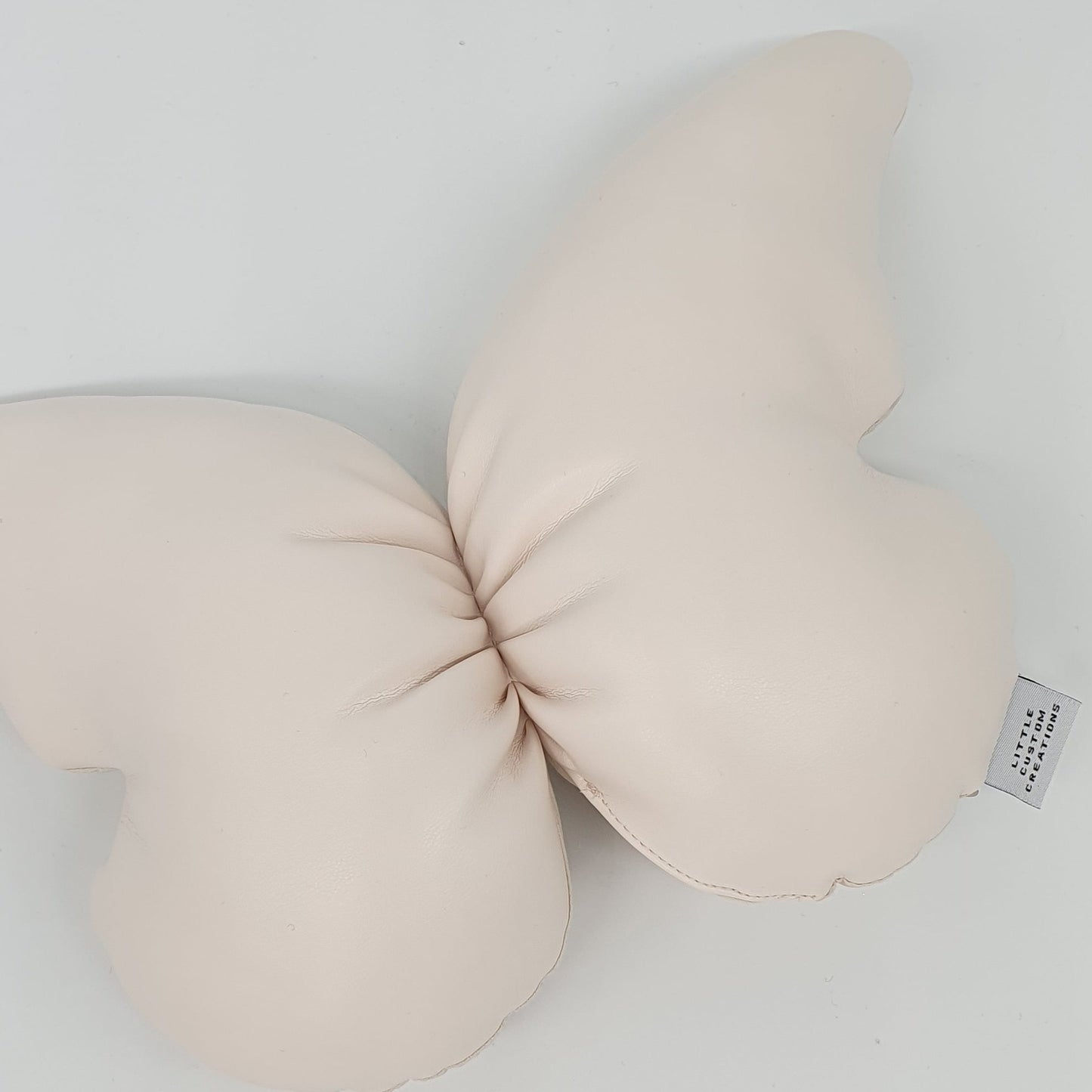 Nude Leatherette Butterfly Cushion